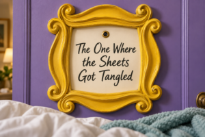 A sign on a purple wall that says "The One Where the Sheets Got Tangled"